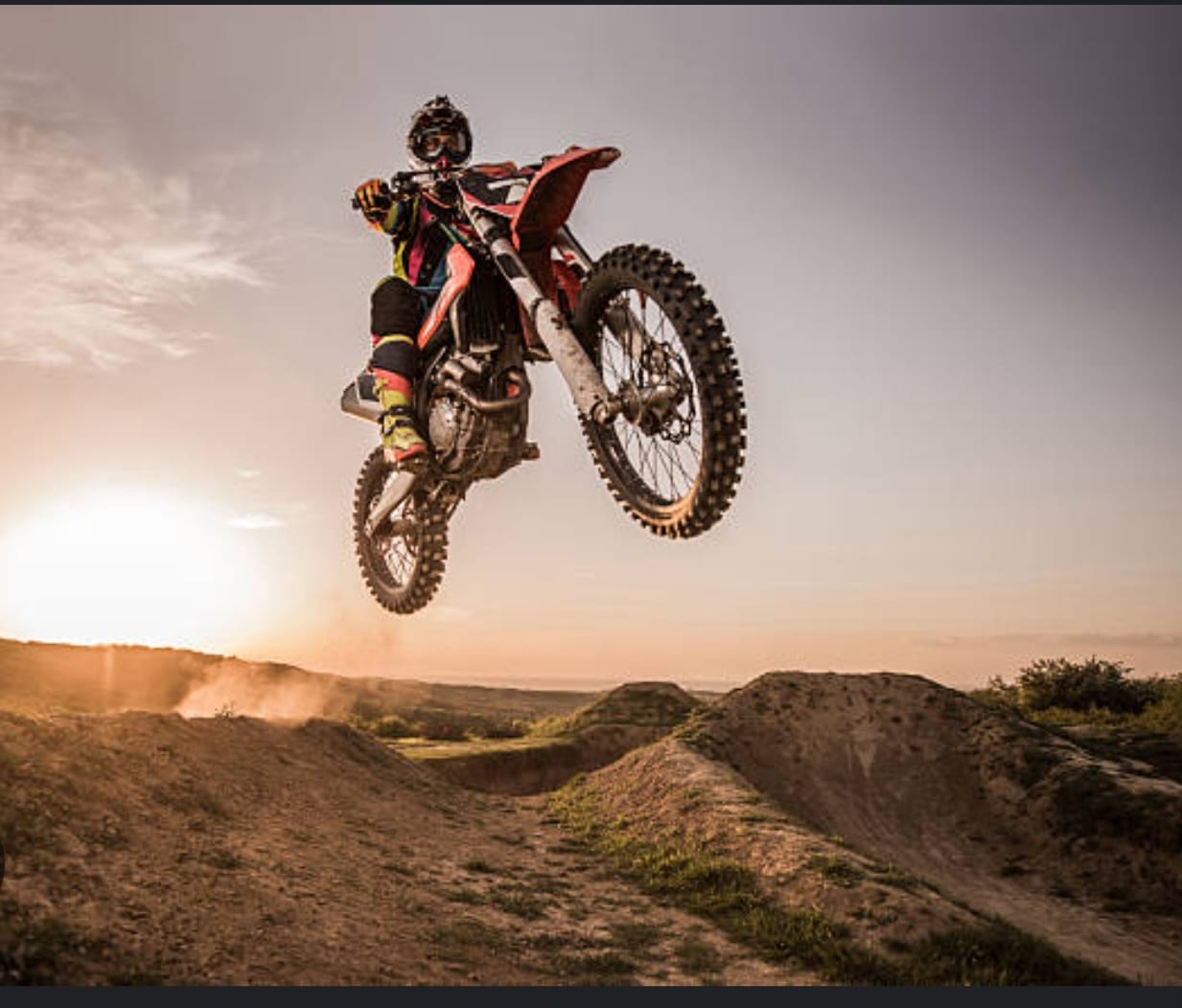 Intense dirt bike racing competition with multiple riders